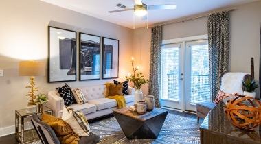 Spacious Living Room with a Living Room Ceiling Fan at Our Roswell Rd Apartments