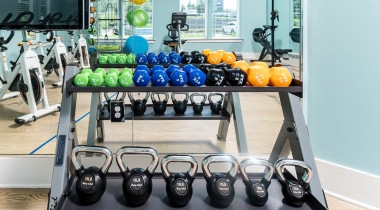 Weights in the Fitness Center with a Yoga/Spin Studio at Our Apartments for Rent in Peachtree Corners, GA