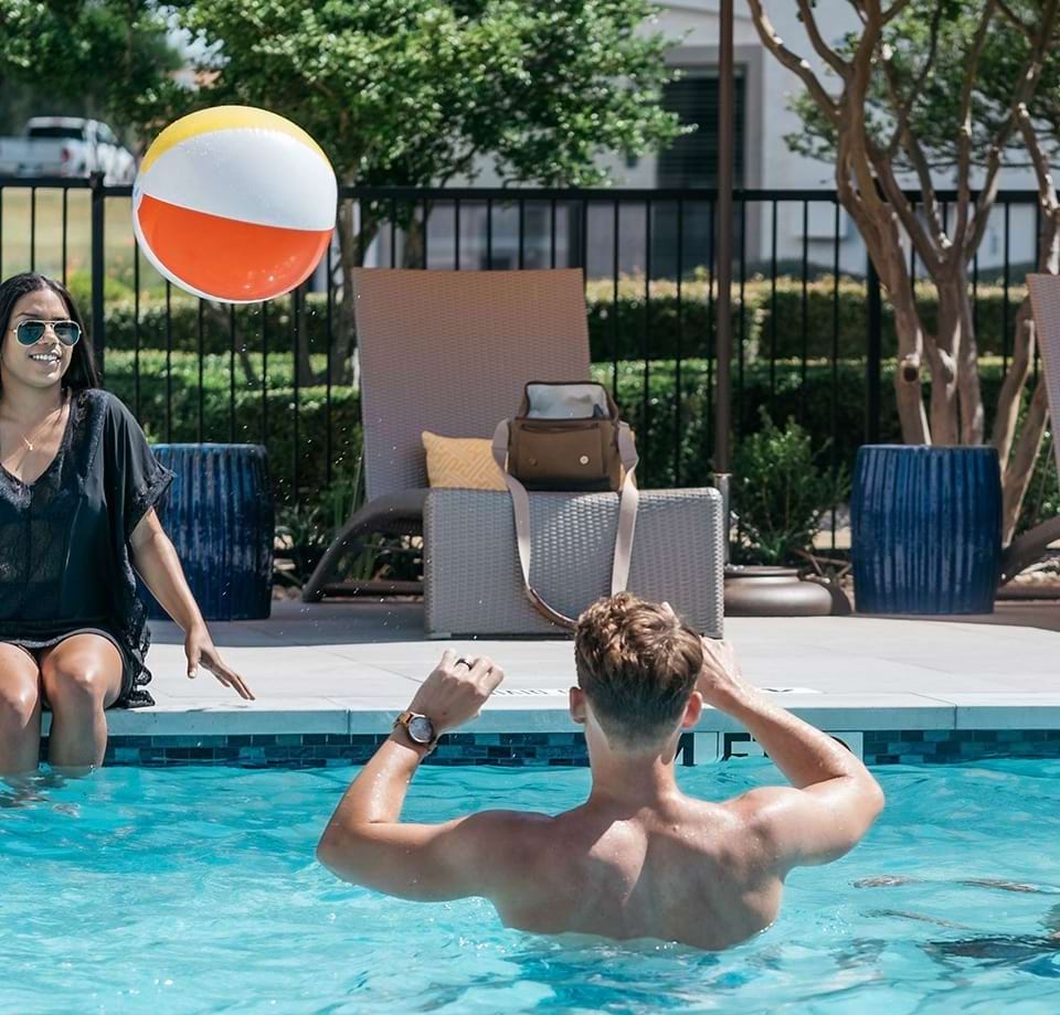 Residents Enjoying the Pool at Our Cortland Apartments
