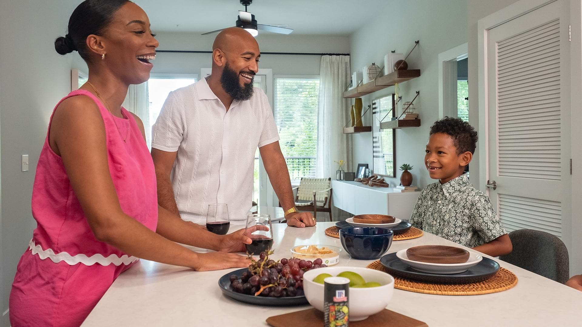 Family Enjoying the Kitchen of Their Cortland Apartment