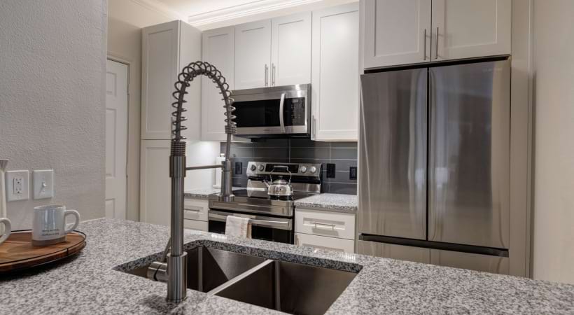 Luxury Kitchen with Stainless Steel Appliances at Our Apartments in West Houston, Texas