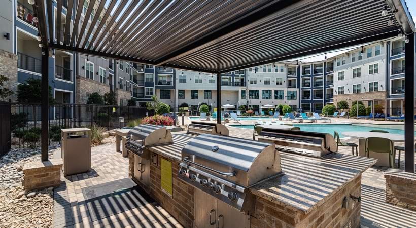 Outdoor Kitchen at Our Cottonwood Creek Apartments in Allen, TX