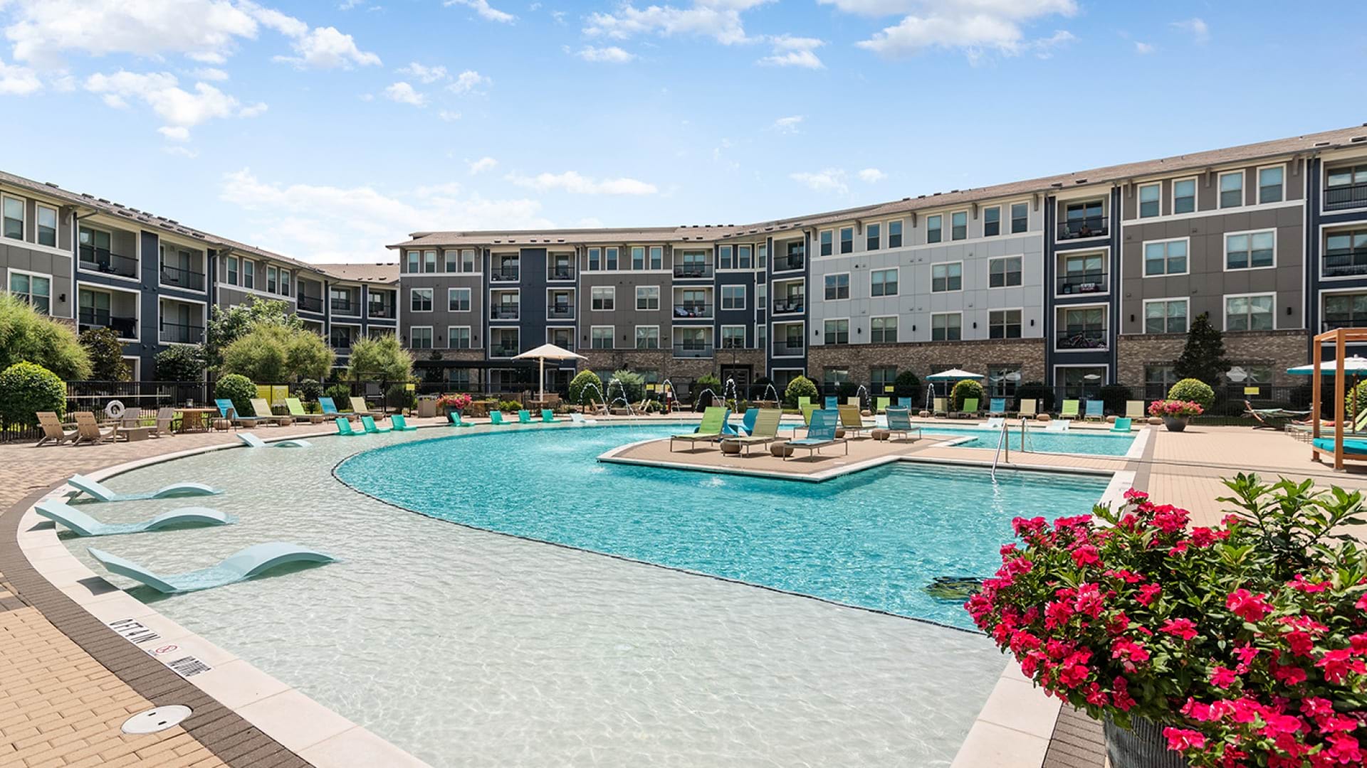 Resort-Style Pool And Sun Deck At Our Apartments For Rent In Allen, TX