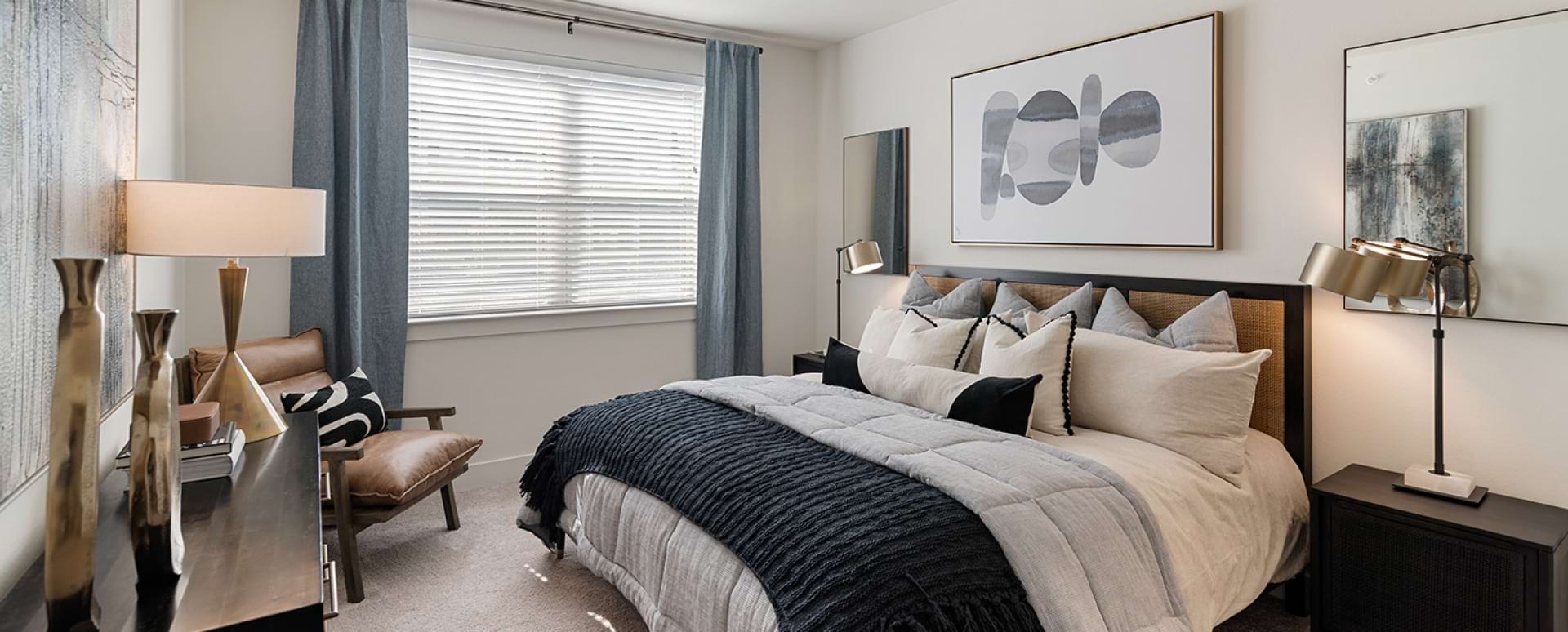 Bedroom with Ceiling Fan at Our Apartments in Lewisville, TX