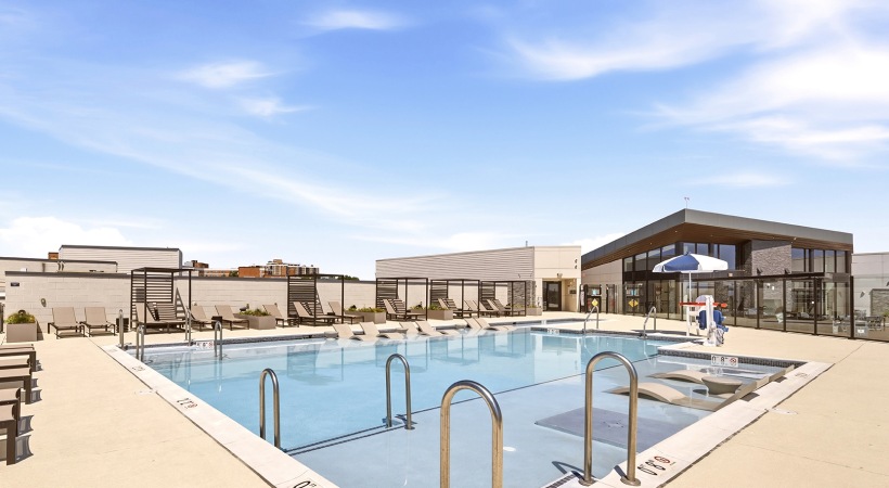Rooftop Pool with Lounge Chairs at Our Apartments Near Ronald Reagan Airport