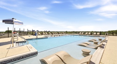 Rooftop Pool with Lounge Chairs at Our Columbia Pike Apartments in VA