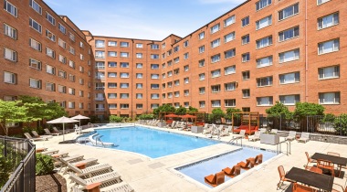 Resort-Style Pool and Sun Deck with Lounge Chairs at Our Apartments Near Columbia Pike
