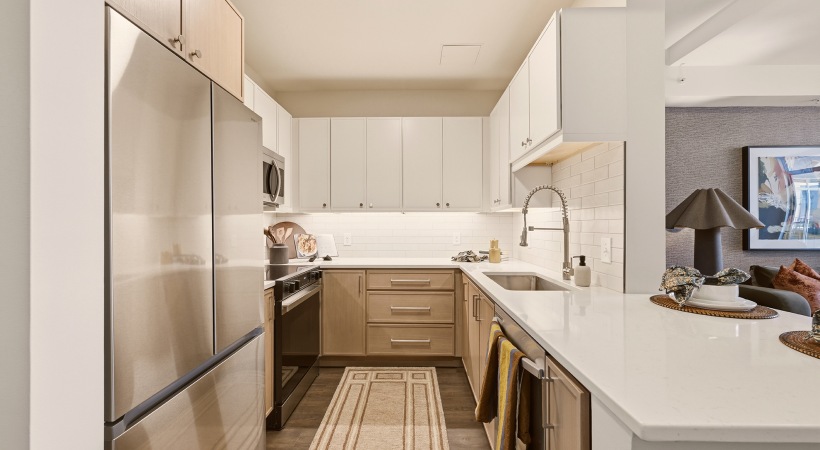 Modern Cabinetry with Under-Cabinet Lighting & Tile Backsplashes