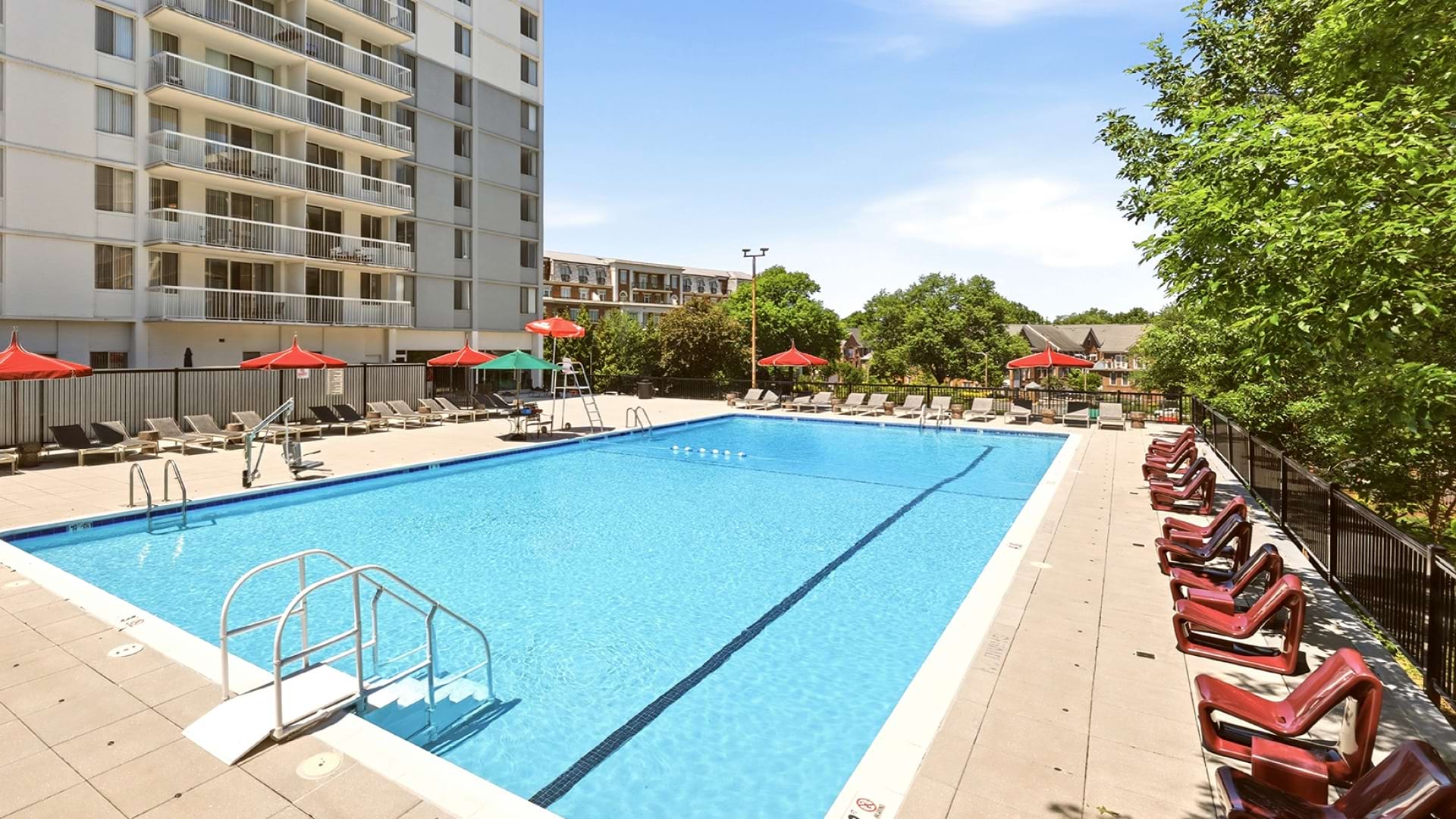Sparkling, Resort-Style Pool and Sun Deck with Lounge Chairs Near Our Apartments in McLean, VA