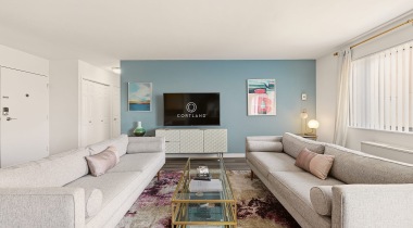 Spacious Living Room with Large Windows at Our Arlington Apartment Community