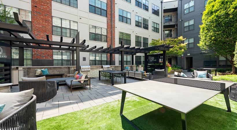 Outdoor Courtyard with Gas Grills and HDTVs