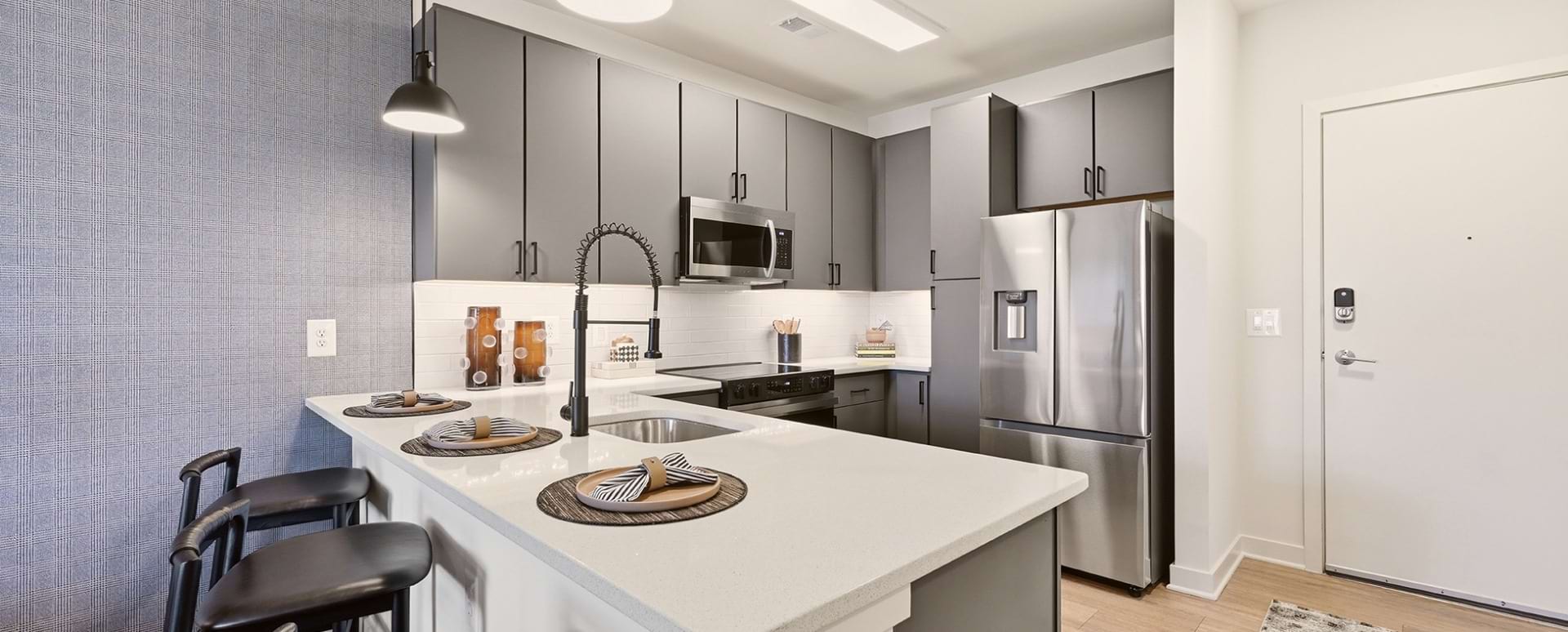 French-Door Refrigerators with Water/Ice Dispensers in Our Arlington, VA Apartment Home Kitchens