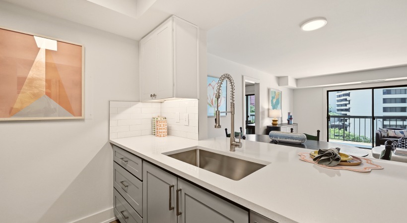 Modern Cabinetry with Designer Hardware and Tile Backsplashes