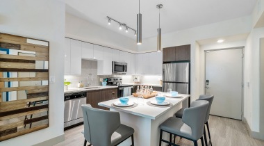 Modern Kitchen with Two-Tone Cabinetry at Our Apartments for Rent in Boca Raton