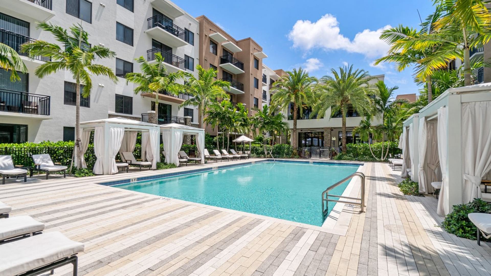Heated, Resort-Style Pool and Sun Deck at Our Luxury Apartments in Deerfield Beach