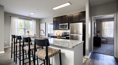 Kitchen with Granite Countertop Island at Our Dublin Apartments near Columbus, Ohio