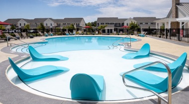 Resort-Style Pool with Lounge Chairs at Our Modern Apartments in Powell, OH