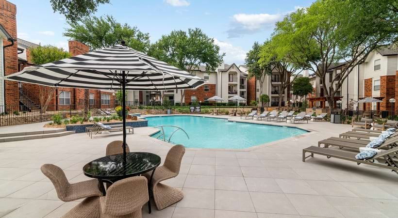 Swimming Pool with a Sun Deck at Our Apartments on Harwood Rd in Bedford, TX