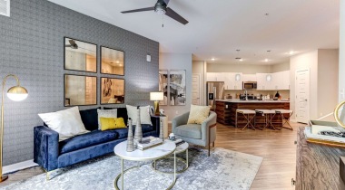 Spacious Living Room with Living Room Ceiling Fans t Our Apartments near Orlando