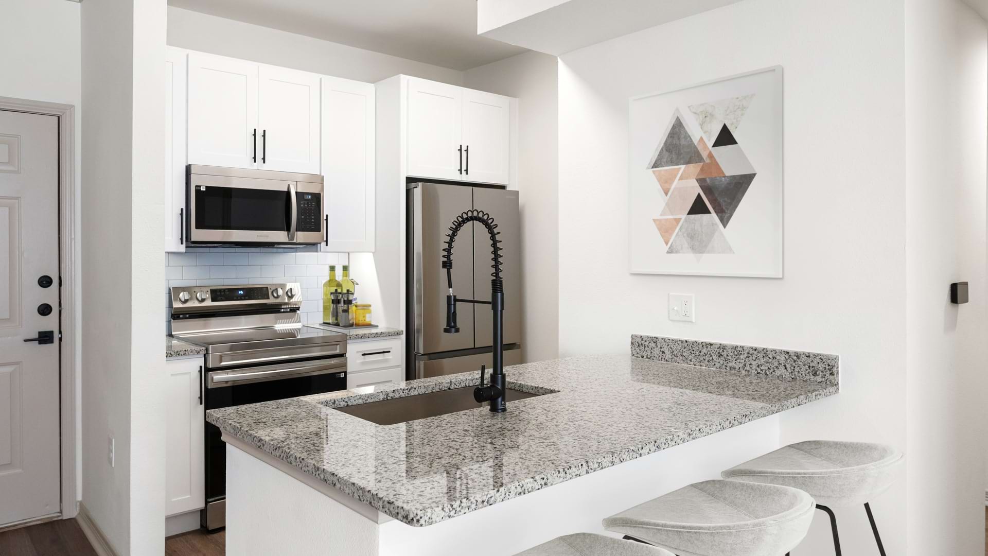 Modern Kitchen with Stainless Steel Appliances in Our Apartments on 1960 in Houston