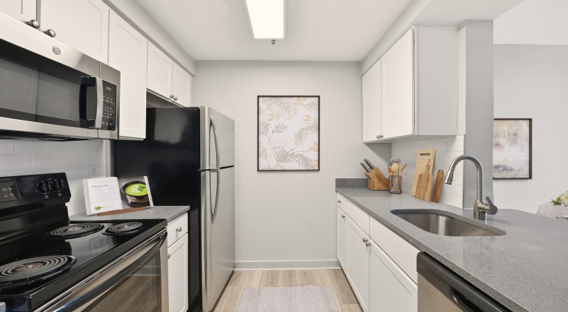 Modern Cabinetry with Designer Hardware and Tile Backsplashes