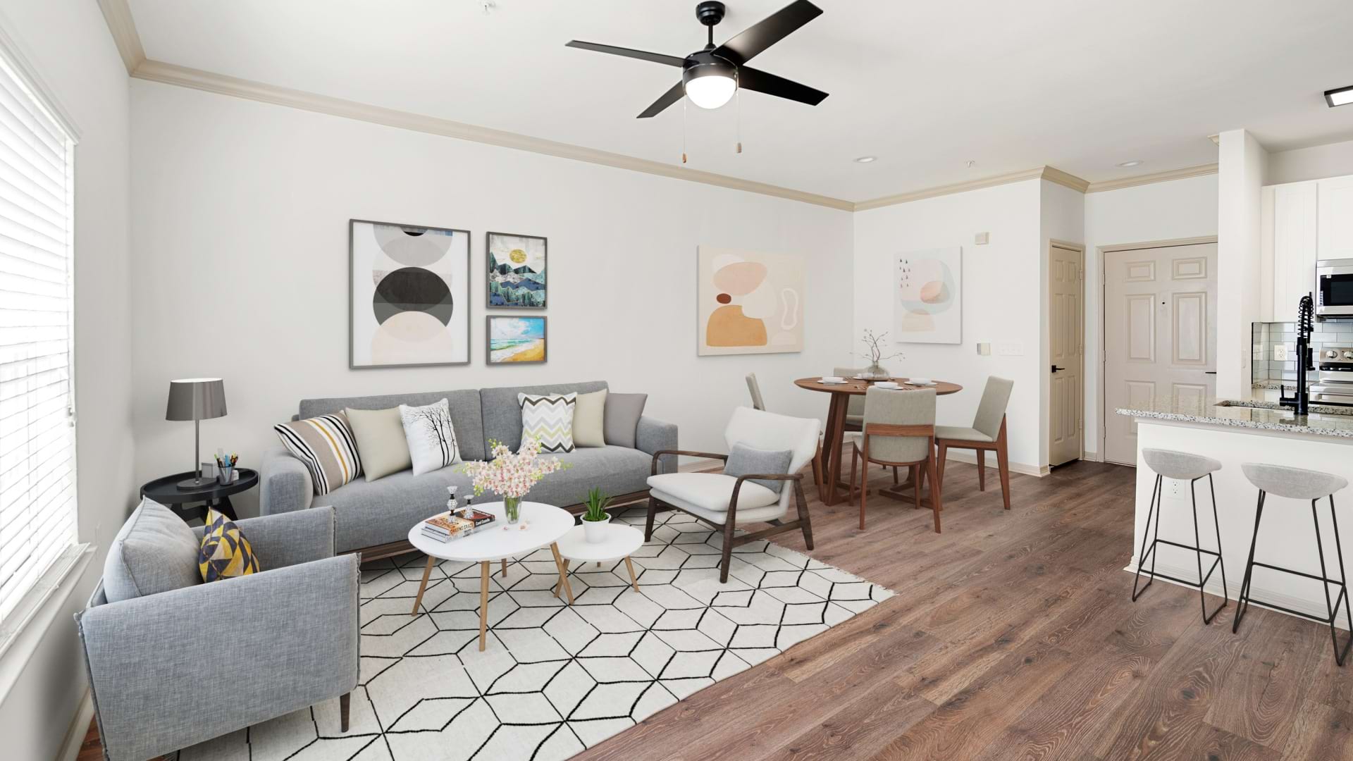 Living and Dining Areas with Wood-Style Flooring in Our Apartments for Rent in Jersey Village, TX