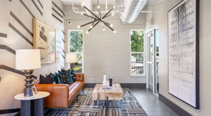 Resident Clubhouse with WiFi, HDTVs, and a Fireplace at Mint Urban Infinity