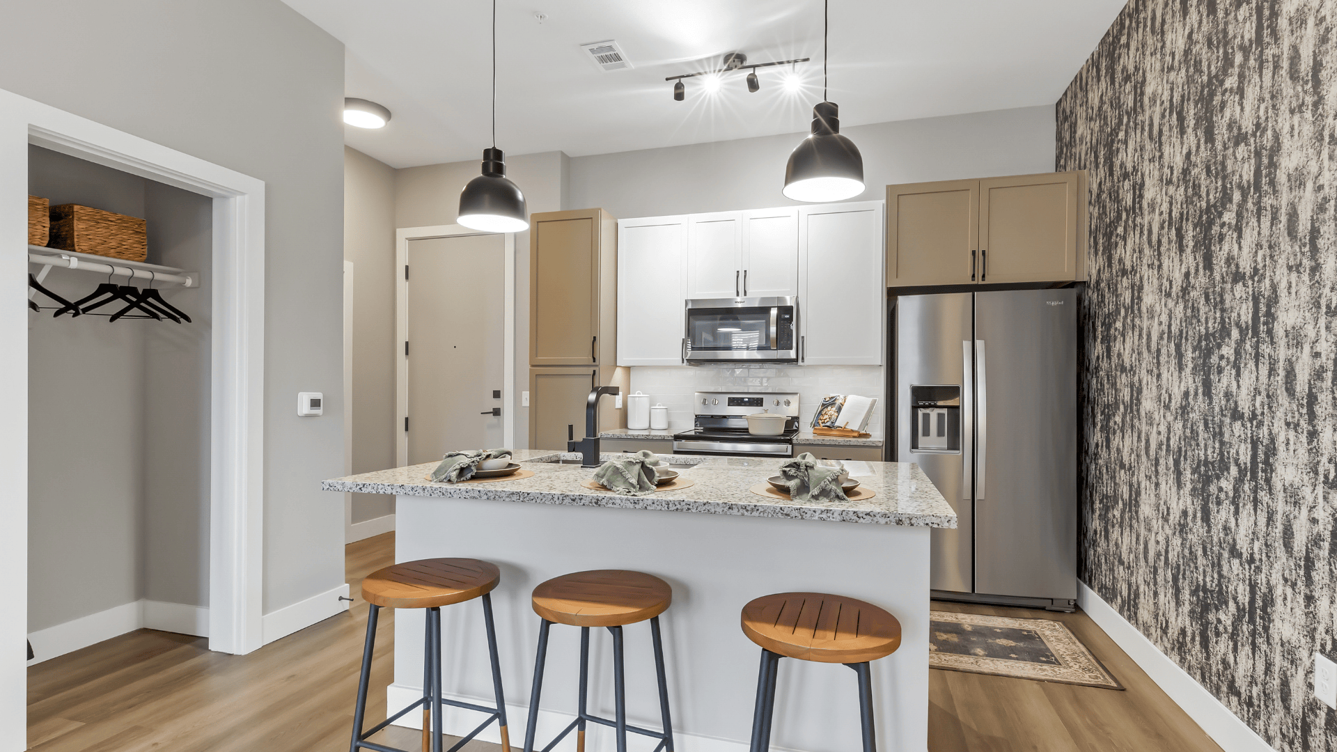 Kitchen with modern lighting at our apartments in North Colorado Springs