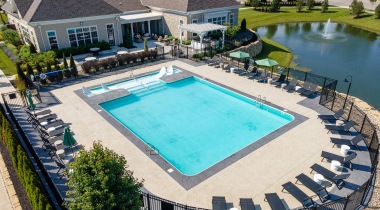 Aerial View of Sunbury Apartment Resort-Style Pool And Community Lake