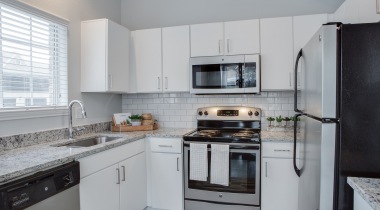 Kitchen with Energy-Efficient, Stainless-Steel Appliances at Our Apartments on Royal Lane in Dallas, TX