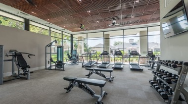 Fitness center at apartments near Carrollton, TX