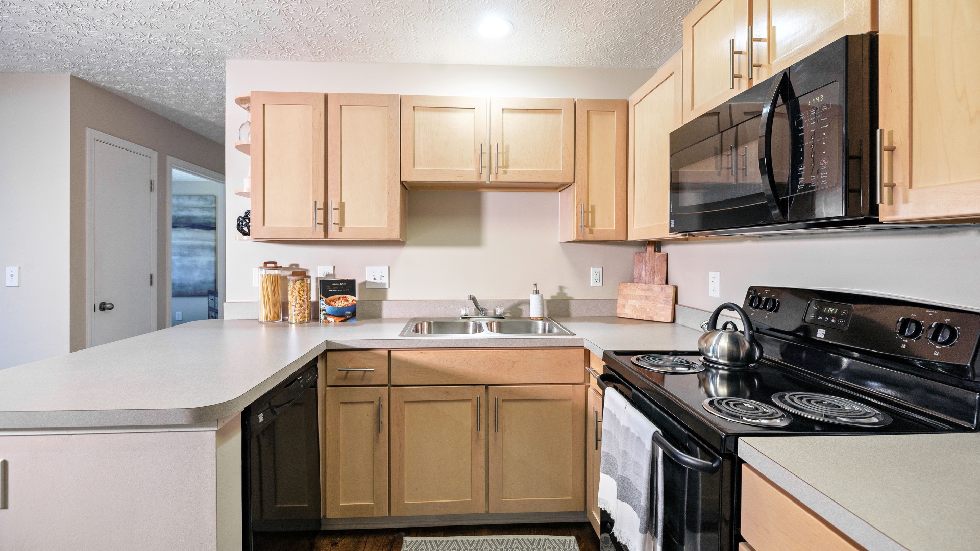 Energy-Efficient, Black Appliances in the Kitchen of Our Canal Winchester Apartments for Rent