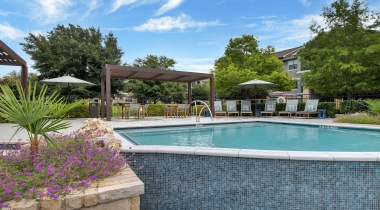 Resort-style pools and sun deck at Cortland Southpark Terraces 