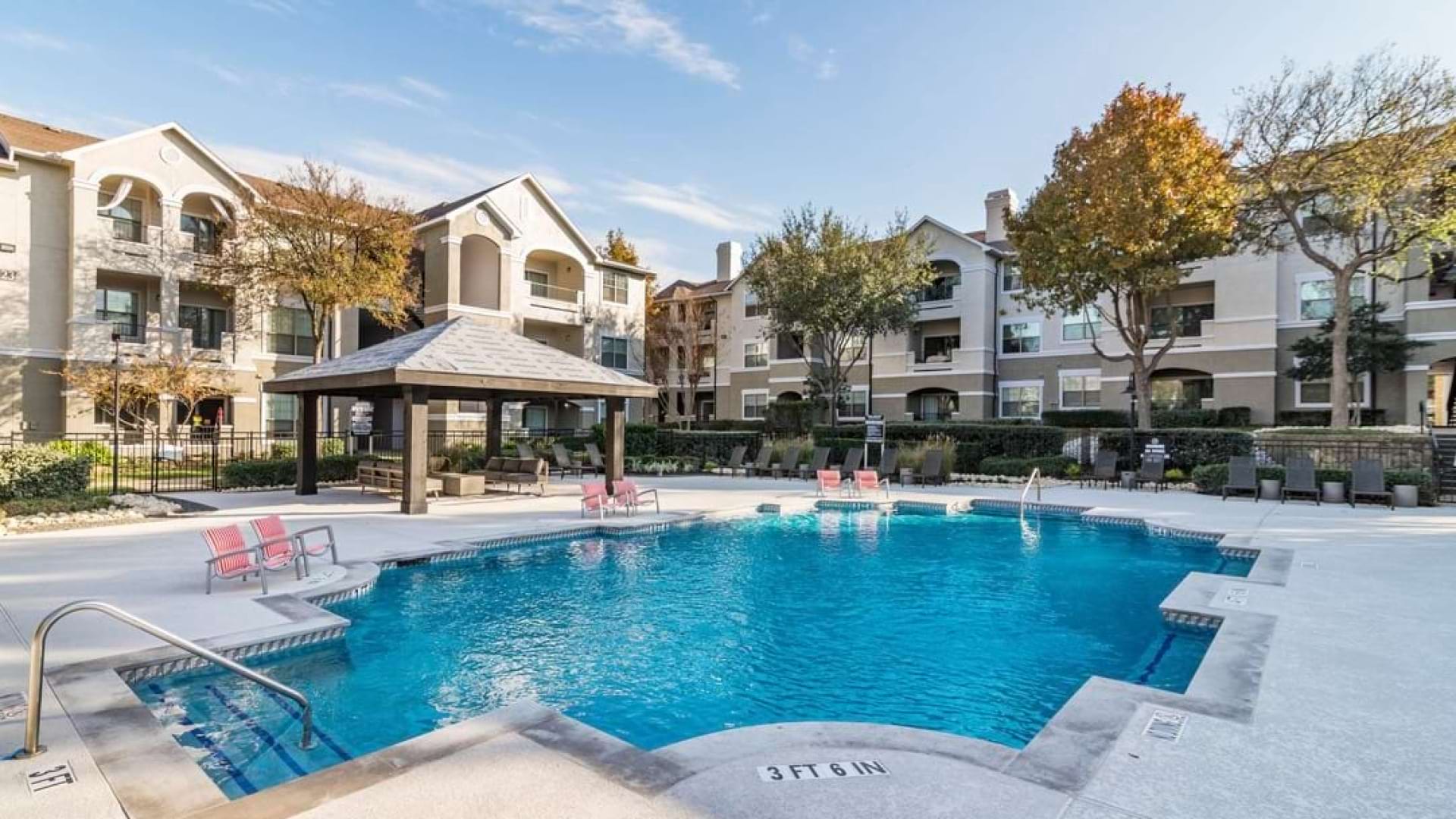 Resort-style pool at  Our Bear Creek Apartments in Euless, TX