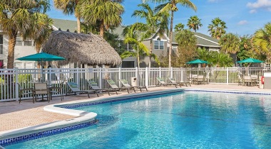 Pool with Lounge Chairs at Our Apartments for Rent in West Kendall, FL