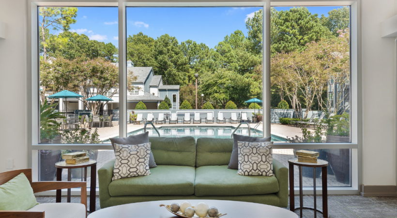 Resident Clubhouse Overlooking the Pool at Our Apartments Near Cotswold
