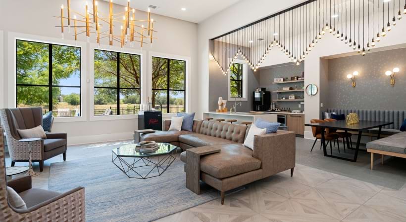 Resident Clubhouse with a Fireplace and HDTV at Our South 1st Apartments