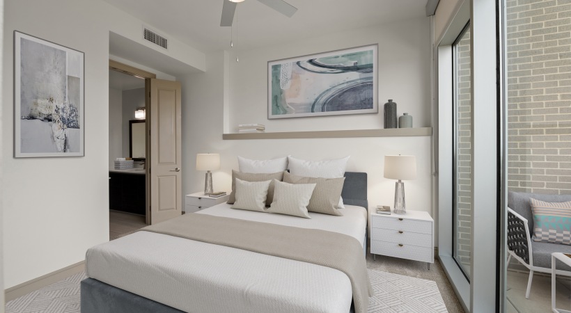 Bedroom with Floor-to-Ceiling Windows in Our South-Central Houston Apartments