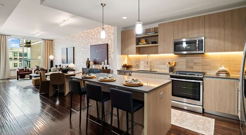 Kitchen with Quartz Countertops and a Gas Range in Our Rice University Apartments in Houston