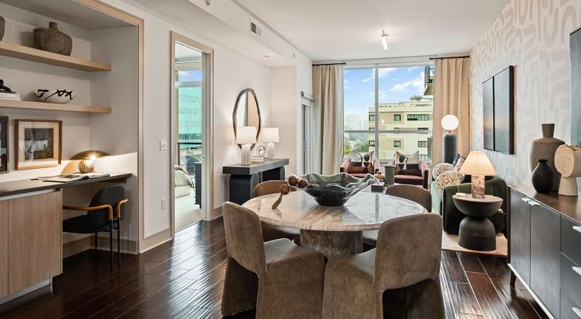 Spacious Living Area with Floor-to-Ceiling Windows in Our Apartments Close to Texas Southern University