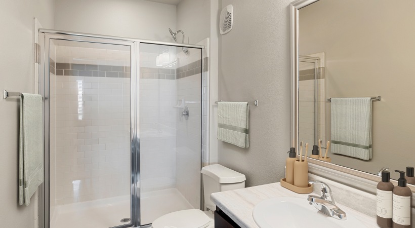 Bathroom with a Walk-in Shower in Our Apartments Near Sugar Land, TX