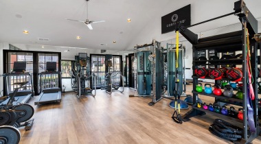 Fitness Center with Weights at Our Hackberry Creek Apartments in Las Colinas