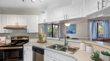 Kitchen with Stainless Steel Appliances at Our Winthrop Town Center Apartments