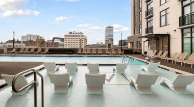 pool with lounge chairs