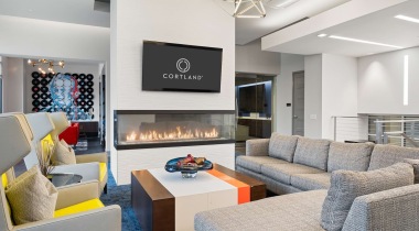 resident lounge with tv and fireplace 