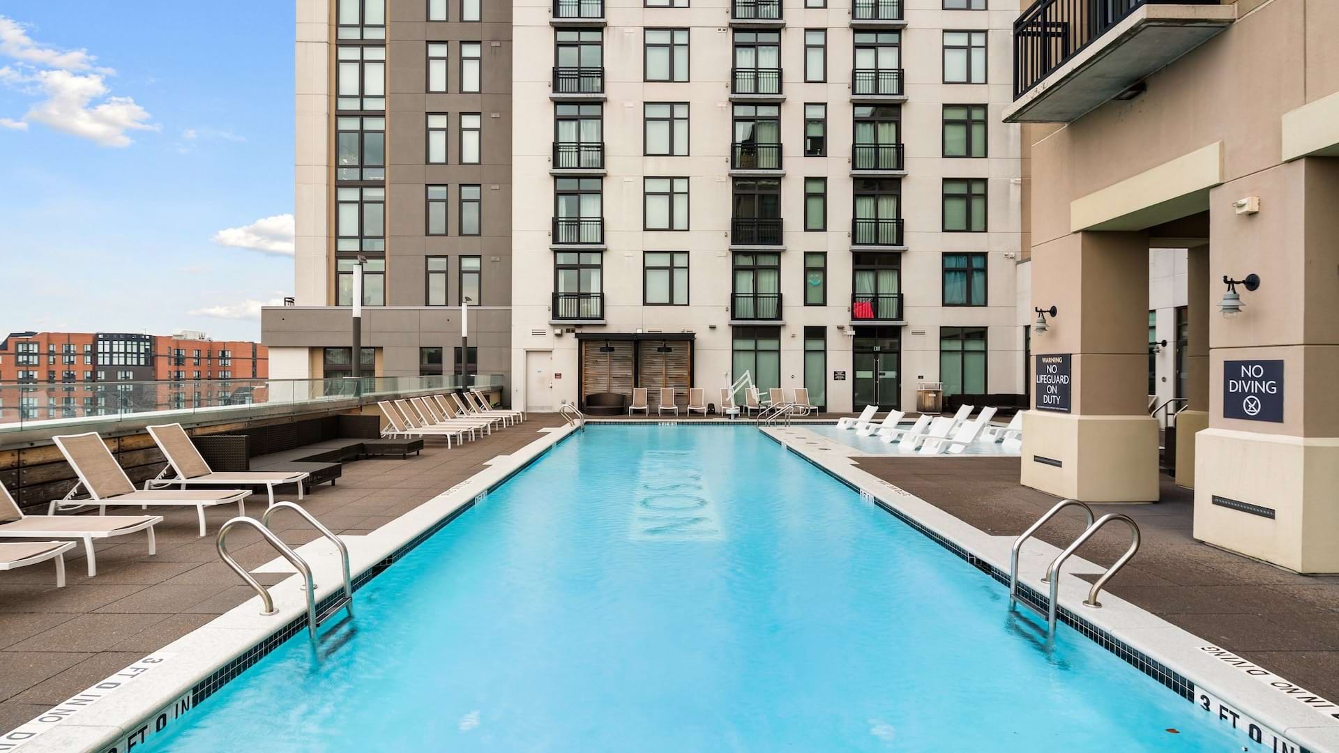 pool with lounge chairs