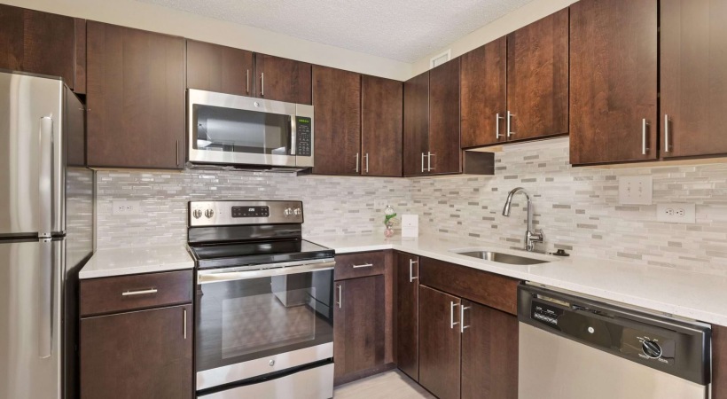 Modern Kitchen with Energy-Efficient, Stainless Steel Appliances at Our Apartments in McLean