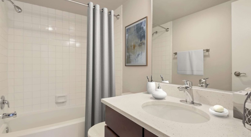 Bathroom with Modern Lighting Fixture at Our Apartments for Rent in McLean