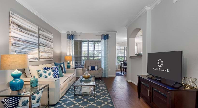 Living Room with Wood-Style Flooring in Our North Tampa, Florida Apartments