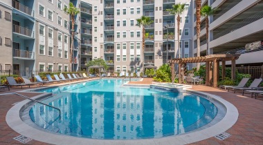 Resort-Style Pool with Cabanas at Our Apartments on 436